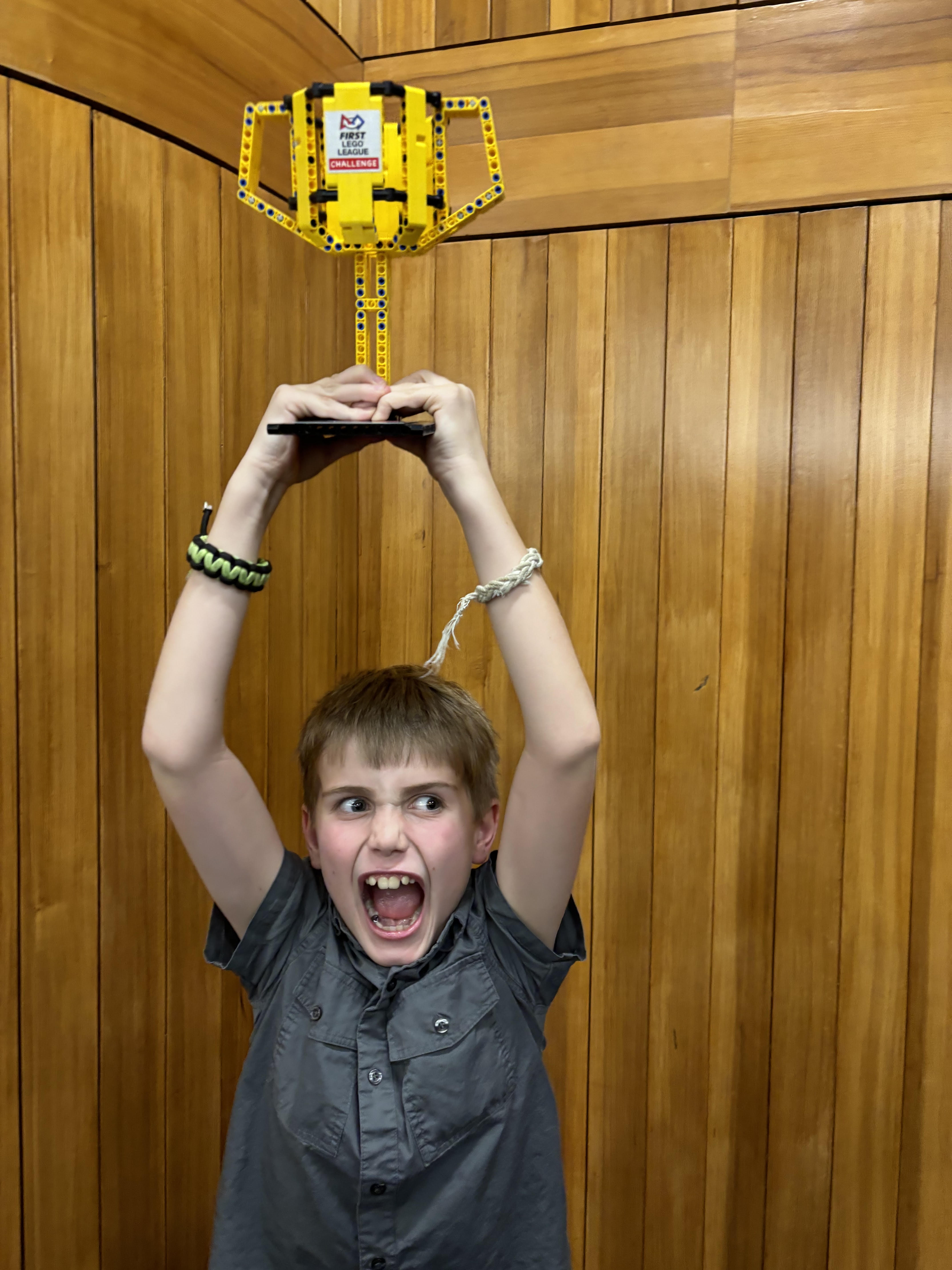 Robocat Jack Adler celebrates an award from the 2024/2025 season